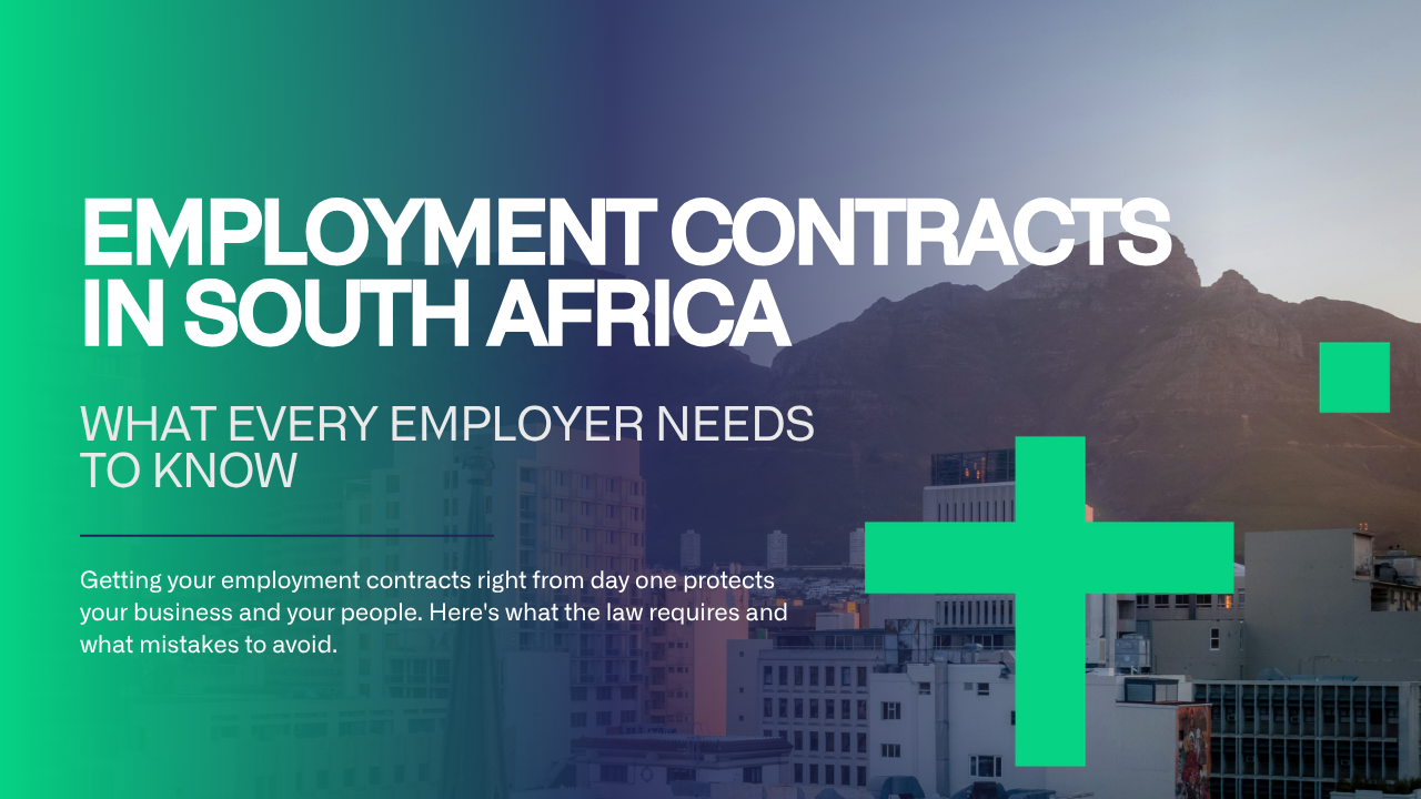 Employer and employee signing employment contracts in South Africa at an office desk