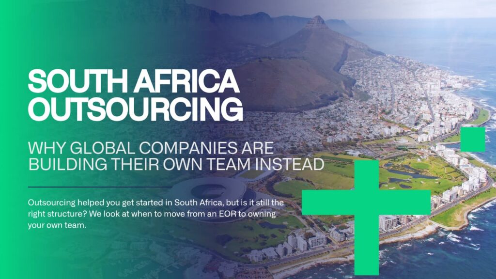 International team reviewing South Africa outsourcing options on a laptop